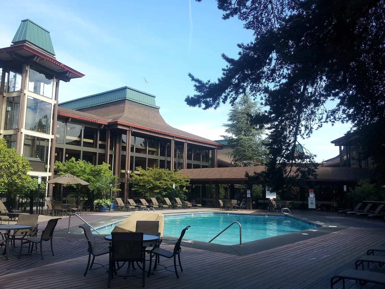 Pool courtyard and lodge-style buildings at DoubleTree by Hilton Seattle Airport